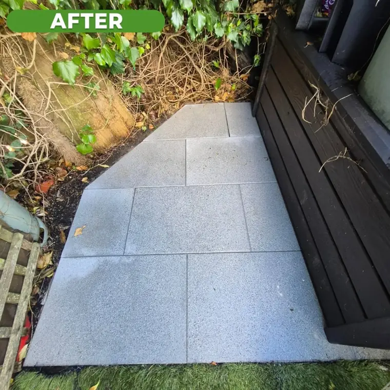 The same side patio after cleaning, slabs uniform and bright.
